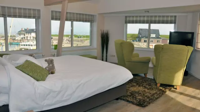 Slaapkamer De Schapenboet bij hotel Havenzicht VVV Texel