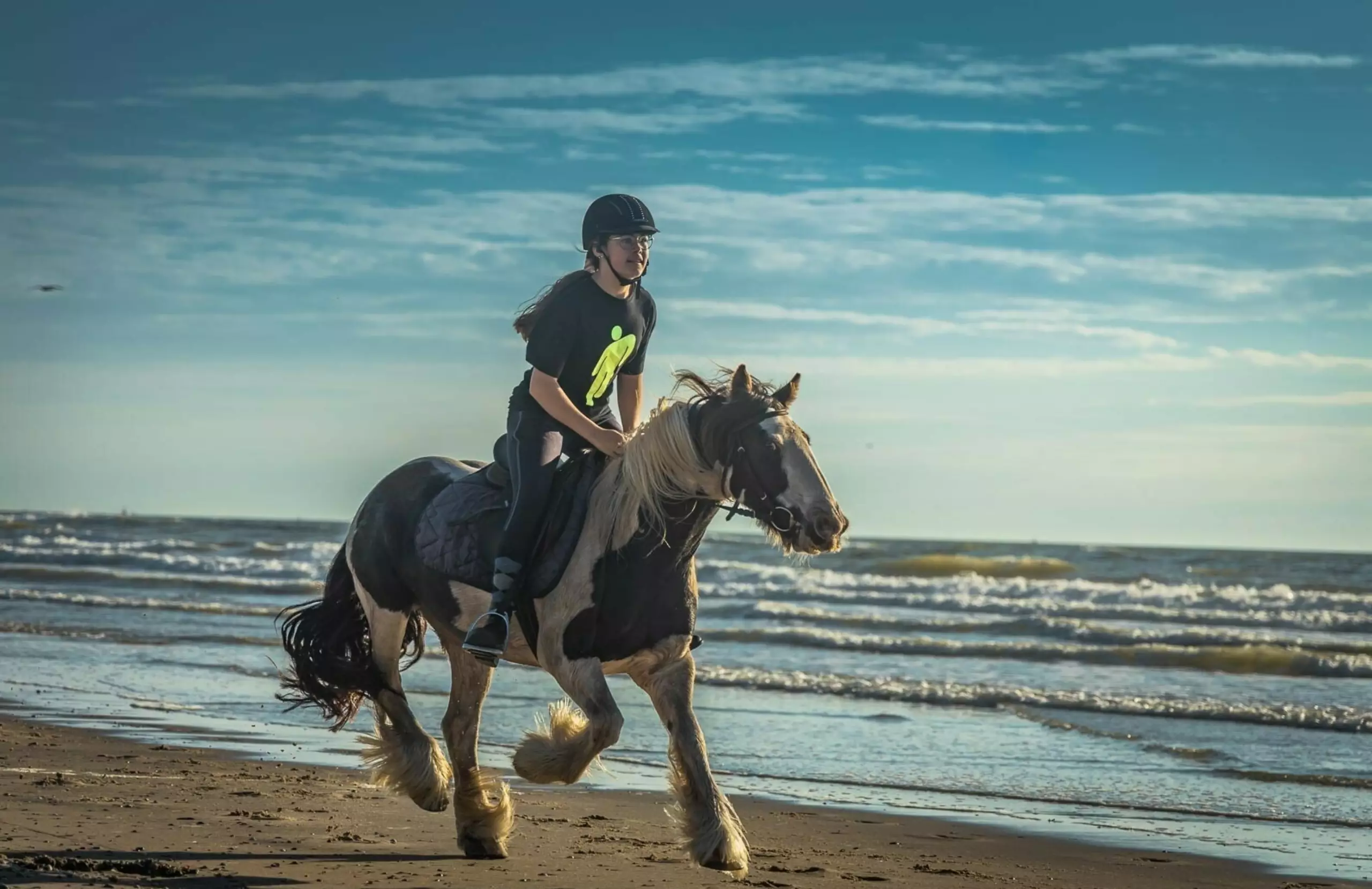 Strandrit met paard