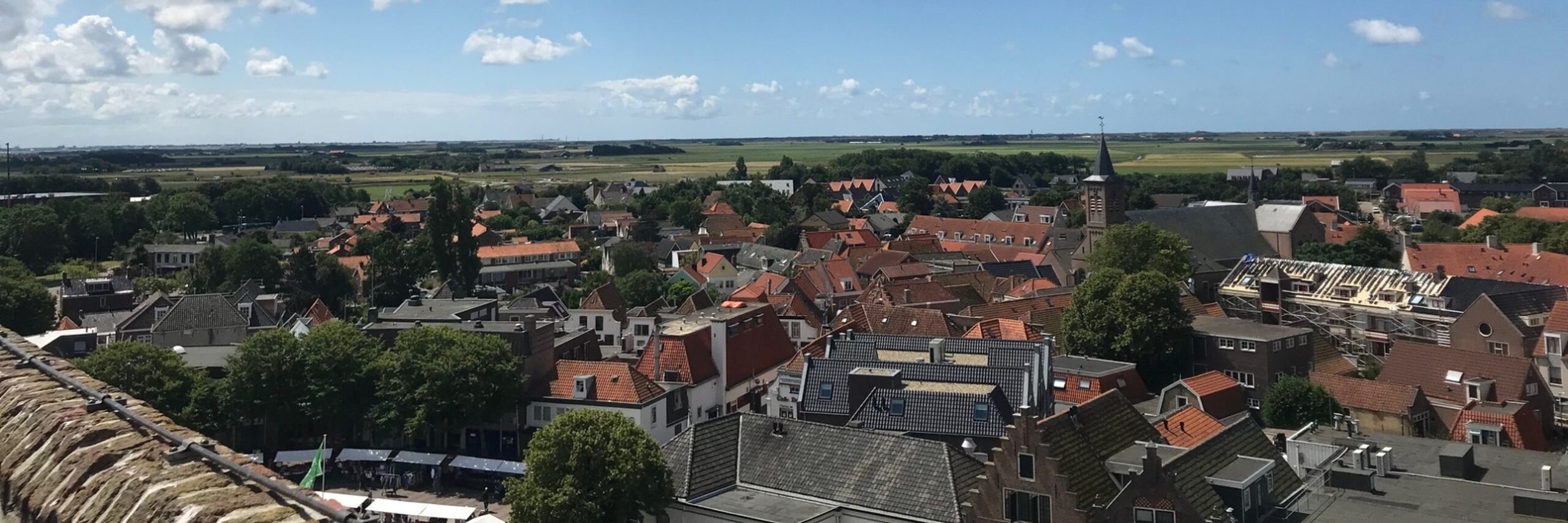 Uitzicht vanaf de kerktoren op Den Burg VVV Texel