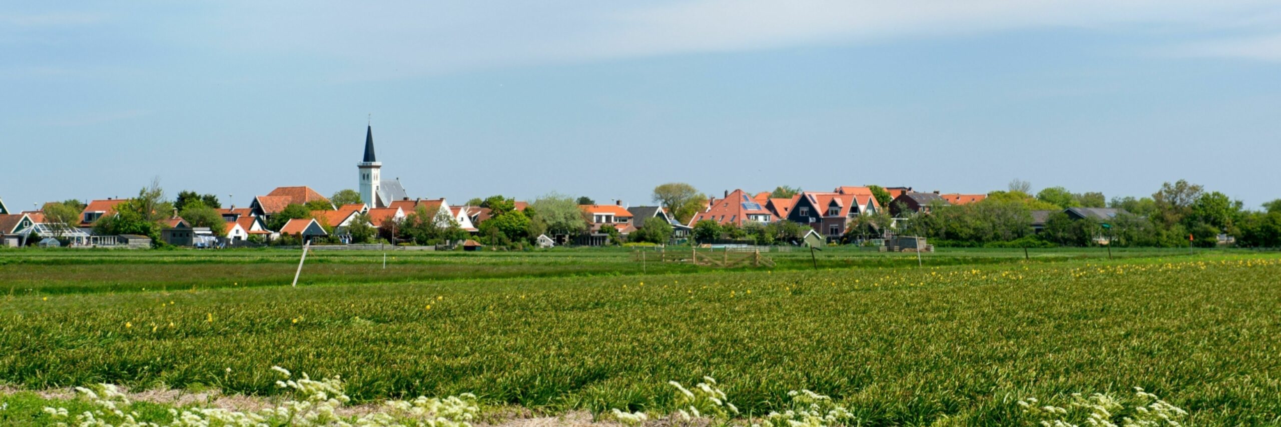 Uitzicht over de landerijen naar Den Hoorn VVV Texel