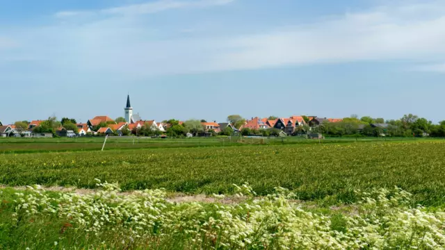 Uitzicht over de landerijen naar Den Hoorn VVV Texel