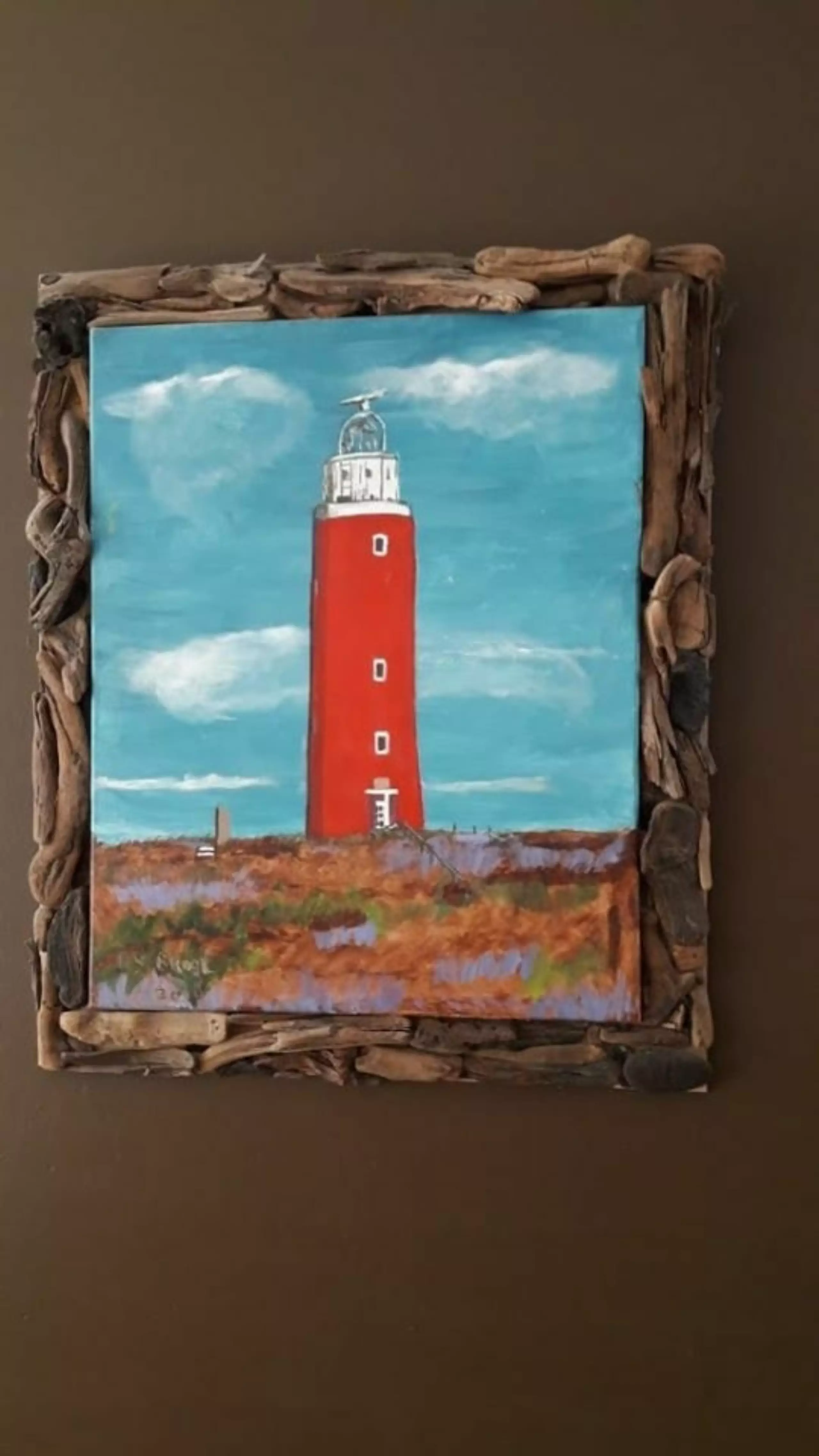 Schilderij aan de muur