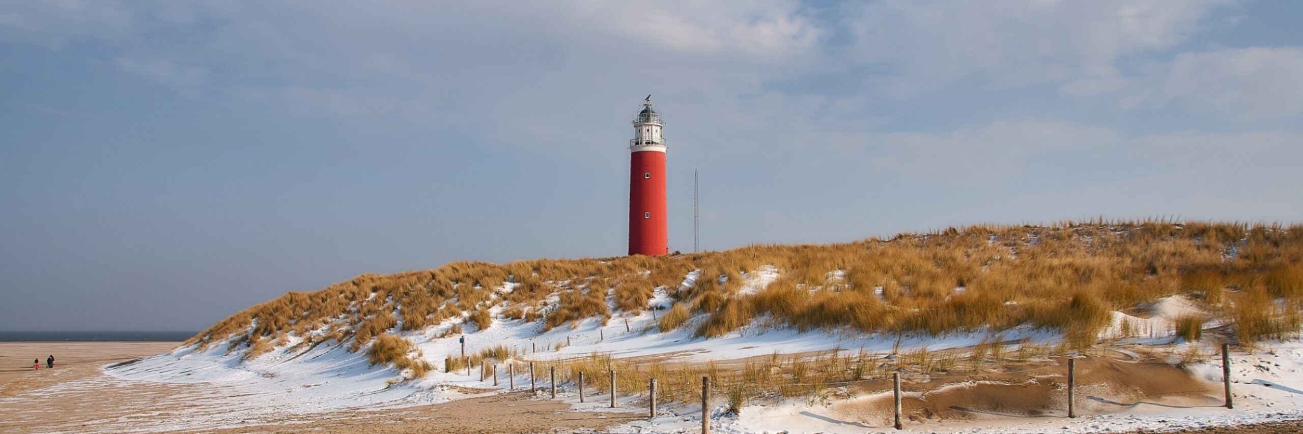 Vuurtoren in de sneeuw fotograaf Justin Sinner VVV Texel