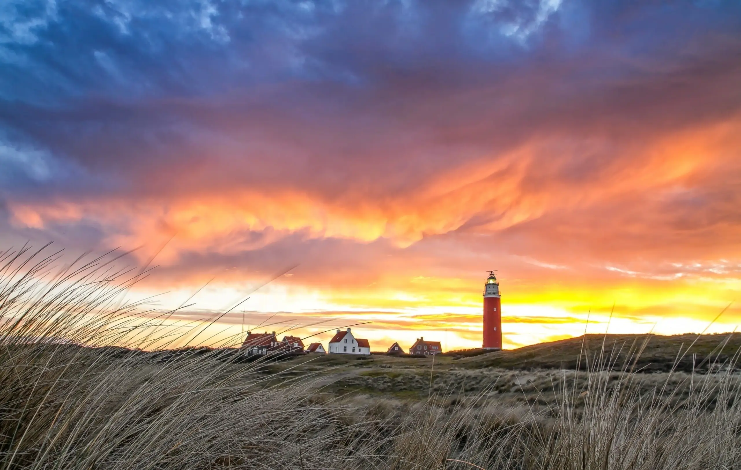 Lighthouse with cloudy sky
